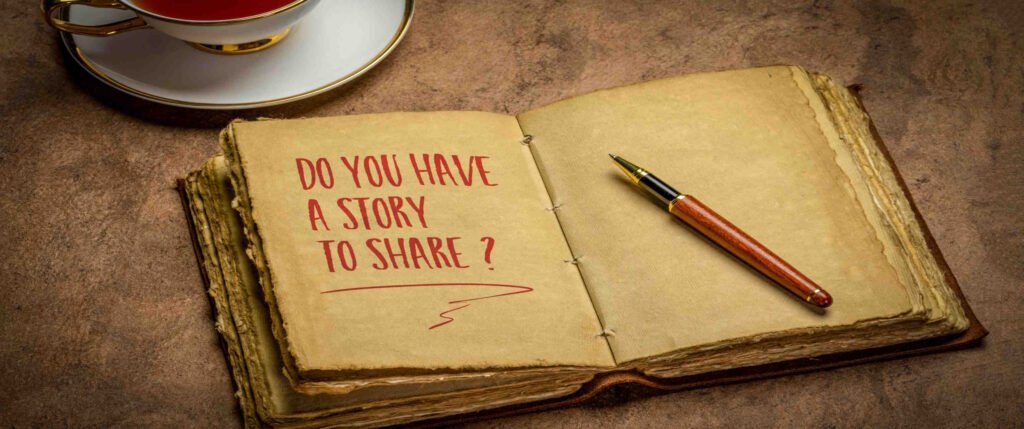 do you have a story to share? handwriting in a retro journal with a cup of tea, storytelling concept.